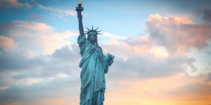 The Statue of Liberty in New York Harbor at Dawn